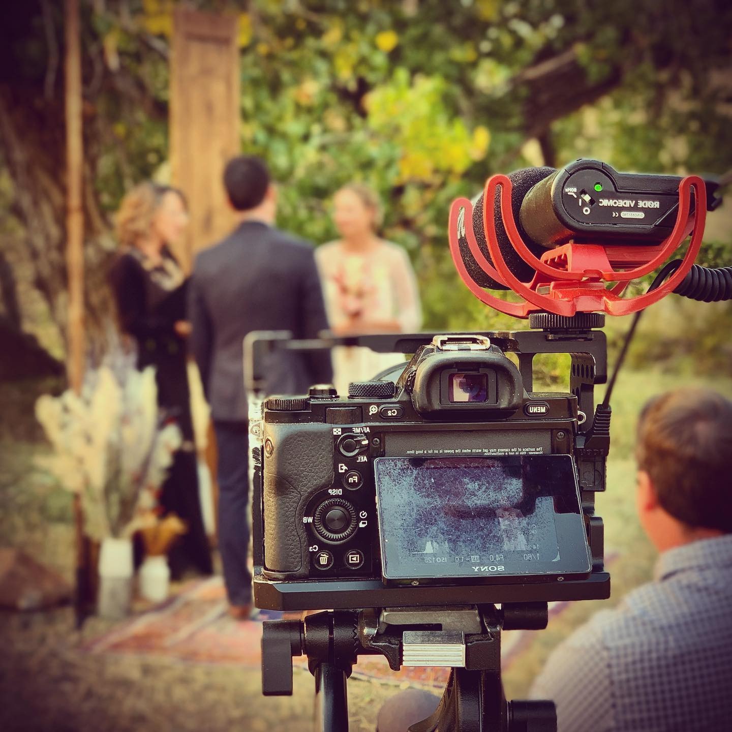 Tim filming a wedding in the Colorado mountains